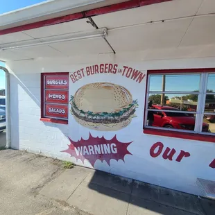 a sandwich on the outside of the building