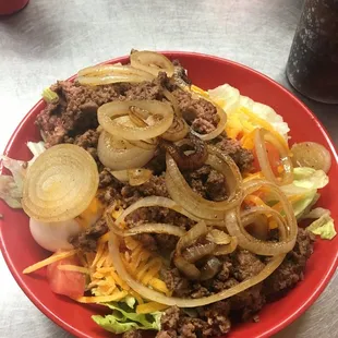 Burger salad with extra fried onions