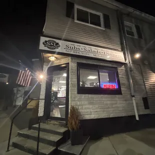 the front of the building at night