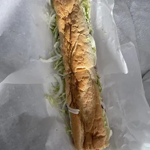 Imported Italian Sub!! Topped with mayo, spicy mustard, onions, lettuce, and banana peppers. So good!!