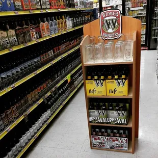 a display of bottles and glasses