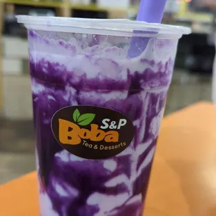 Ube Milk Tea with 50% sweetness. Just right.  Already includes the pearls.