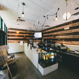 a restaurant with wood paneled walls