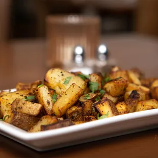 a plate of roasted potatoes