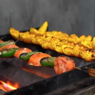  a person cooking on a grill