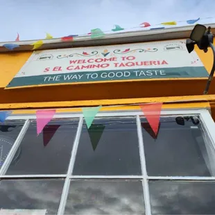 a sign above a window