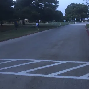 Runners dodging sprinklers again.