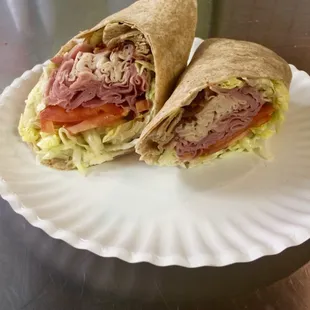 #5 - Club Wrap Ham, turkey, bacon, lettuce, tomato, and mayo in a honey wheat wrap.