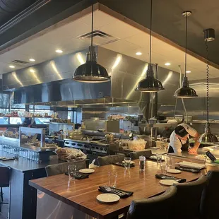 Open air kitchen in the dining area of the restaurant.