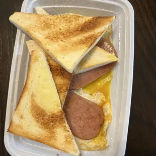 Breakfast A: buttered toast, eggs, spam