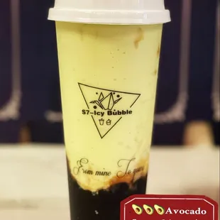 a smoothie in a plastic cup