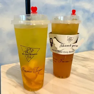 Mango Icy Bubble and Passion Guava Fruit Tea with wings (notice the LARGE chunks of mango to be consumed with this straw)