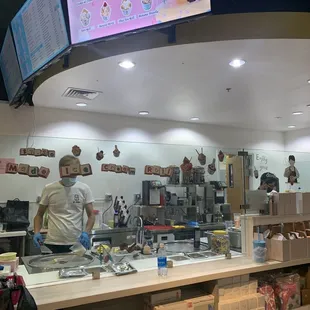 a man working behind the counter