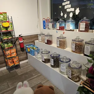Jars of see mui (Crack seed, li hing mui, salted plum, etc.)