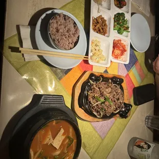 This was taking on Friday Night.  I've got AI Tang (Spicy Fish Roe Soup) and my brother got Beef Bulgogi with side dishes and purple rice.