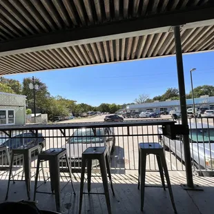 a view of a parking lot from a patio