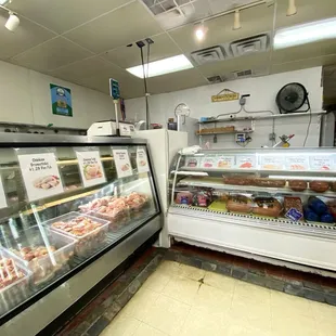 a display of meats and pastries