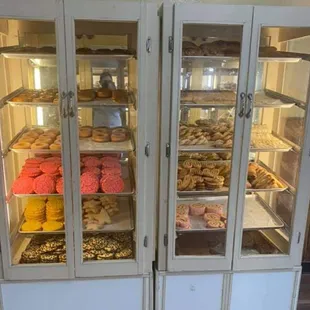 a display case full of pastries