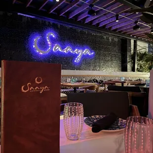 Menu with Saaya logo back drop