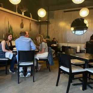 a group of people sitting at a table