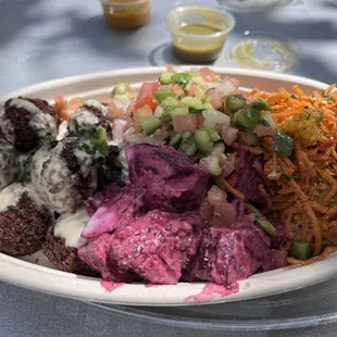 Falafels (plus beet salad, carrot salad and tomatoes cucumbers salad)