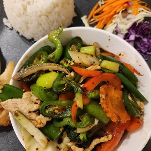 a plate of vegetables and rice