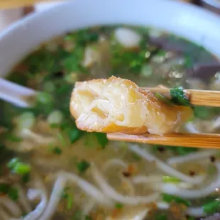 Pa Tong Ko.  This is an Asian type breakfast donut that&apos;s great for dipping into your broth.