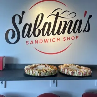 two sandwiches on a counter