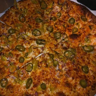 Buffalo chicken pizza with jalapeños.