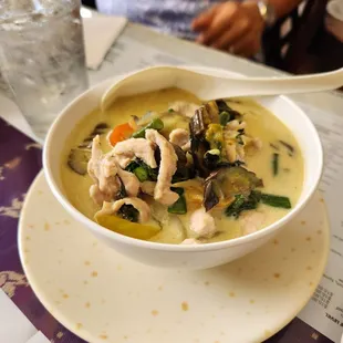Pork green curry, deep delicious, rich flavors and textures. Get it with the sticky rice!