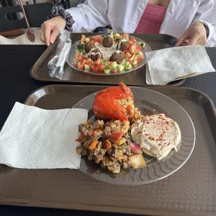 Stuffed pepper, hummus, eggplant, falafel platter.