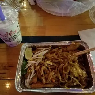 Coconut bubble tea and chicken pad thai.