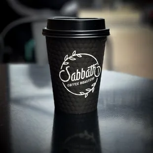 a coffee cup on a table