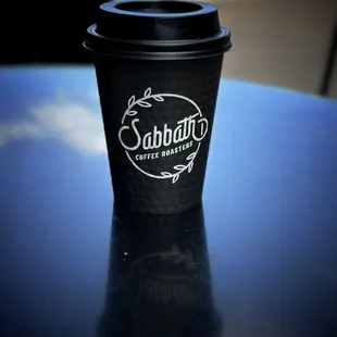 a coffee cup on a table