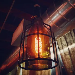 Light fixture made from a recycled bottled