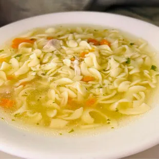 a bowl of chicken noodle soup