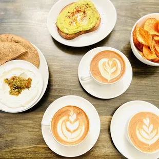 Labneh, Avo toast, cappuccino, latte and oat milk latte.