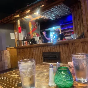 a table with two glasses of water