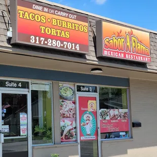 the front of a tacoss and burritos restaurant