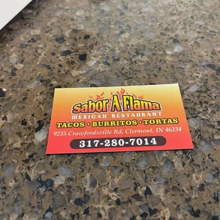 a business card on a counter