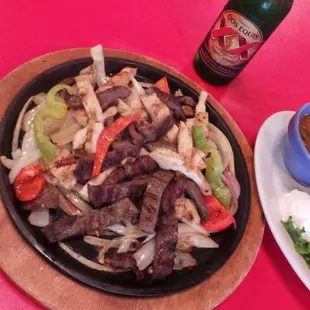 a plate of meat and vegetables