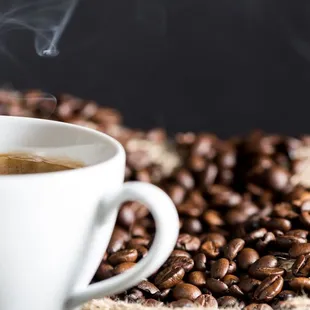 a steaming cup of coffee