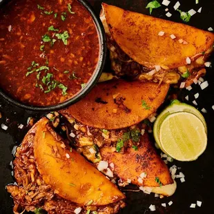 Birria tacos with birria sauce