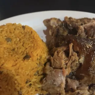 Pernil (slow cooked pork) Arroz con gandules (rice w/pigeon peas)