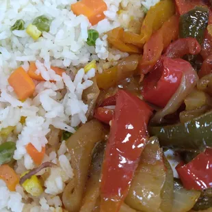a plate of rice and vegetables