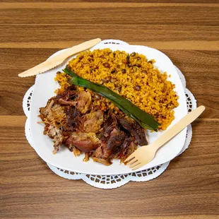 Arroz con gandules y Pernil (yellow rice with pork shoulder)