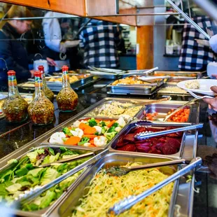 a group of people at a buffet