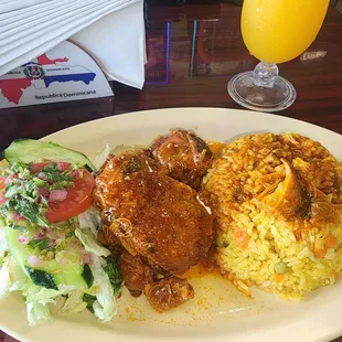 Lunch special Stewed chicken with yellow rice. Mango and passionfruit drink