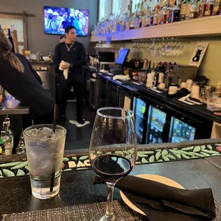 a glass of wine and a glass of water