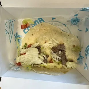 Taco Americano steak.  Barely anything on there.  They could at least filled it up with lettuce.
